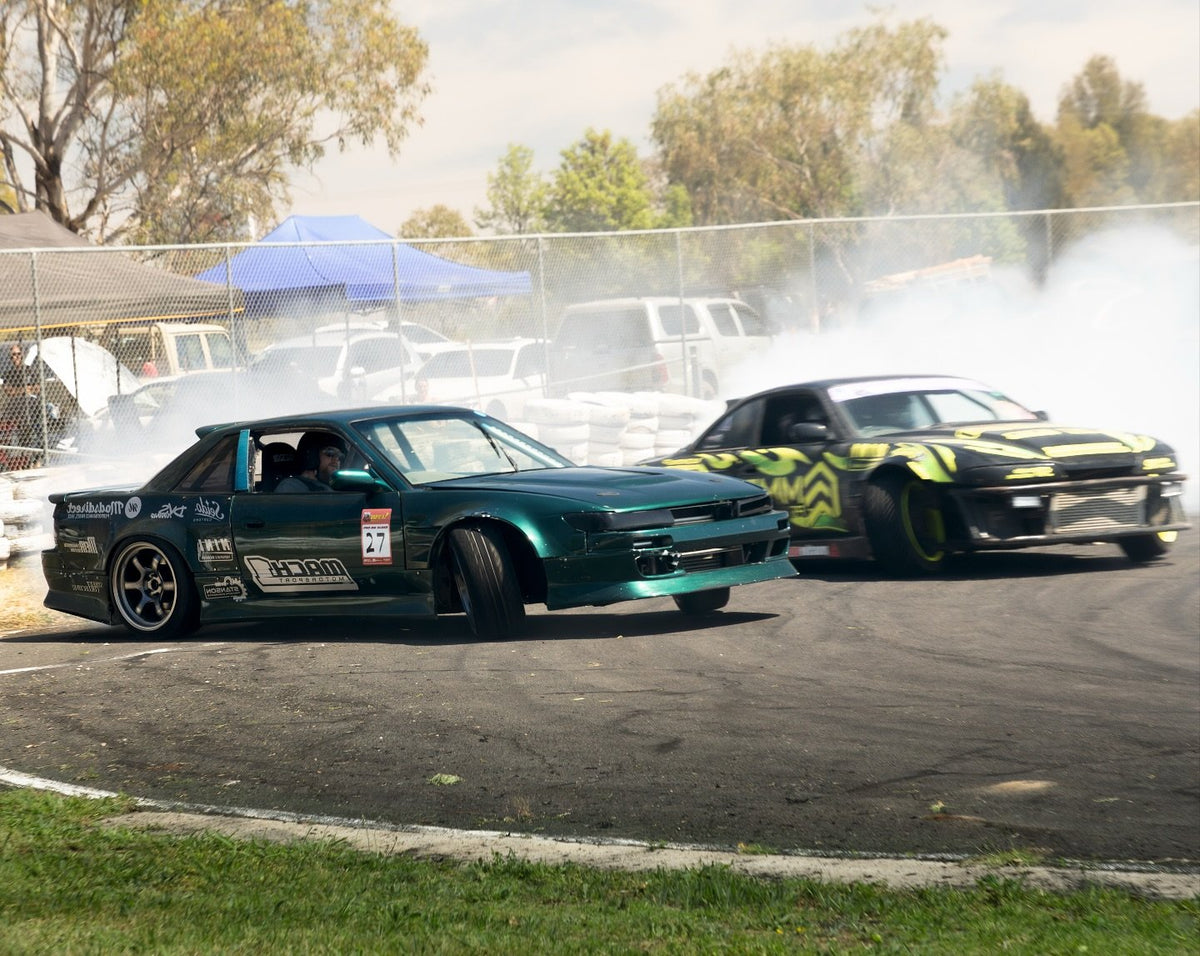 Nissan S13 Silvia on SpeedWorks SW15 wheels drifting in a tandem at Oakburn Park Matsuri 2025
