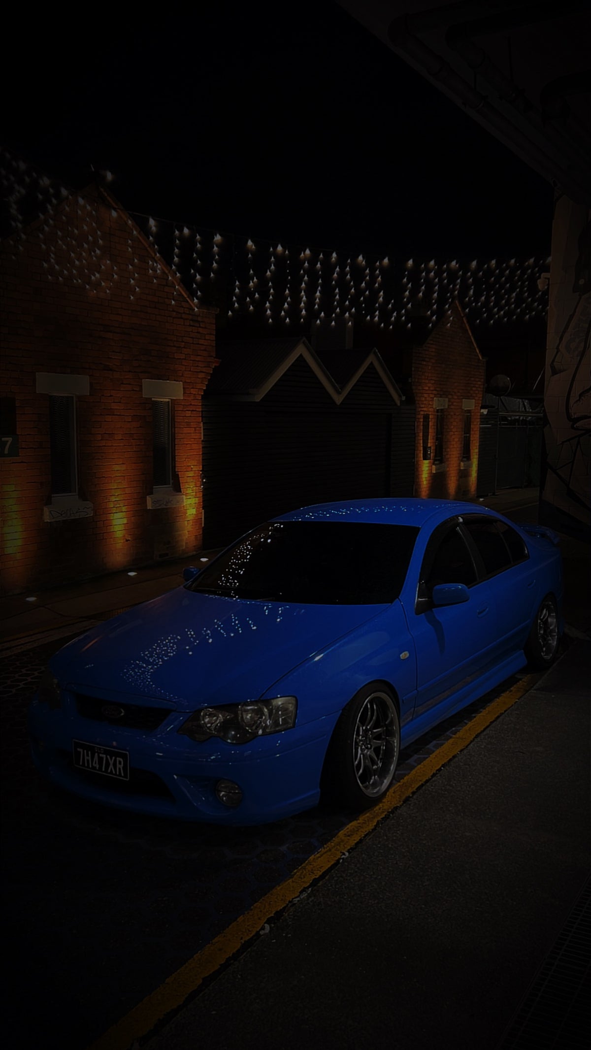 Ford Falcon (BA/BF) on SpeedWorks SW12 18x9.5 +22 Hyper Black & Machine Lip alloy wheels, customer photo 2 of 3