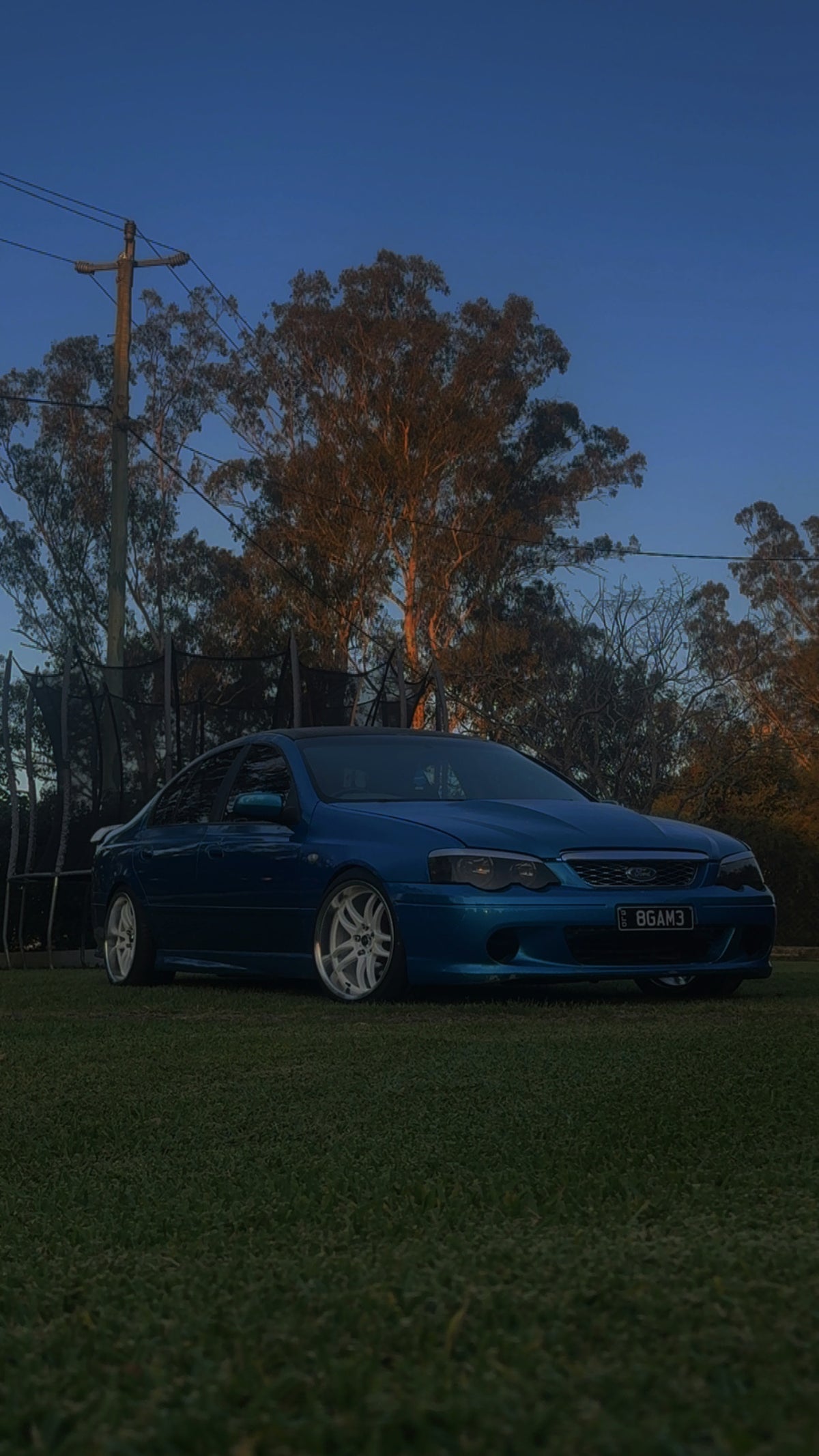 Ford Falcon (BA/BF) on SpeedWorks SW12 18x9.5 +22 Gloss White & Machine Lip alloy wheels