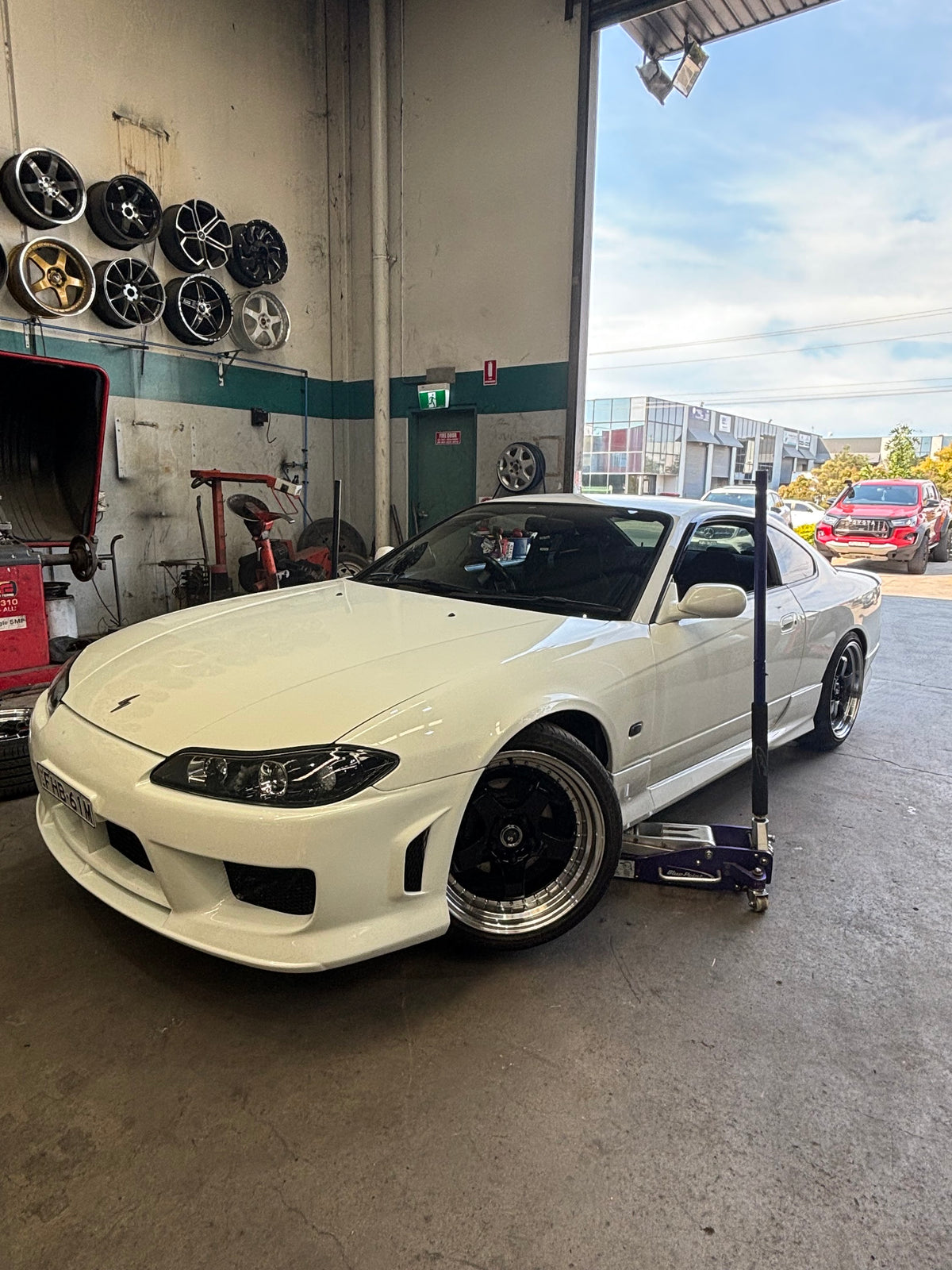 Nissan Silvia (S15) on SpeedWorks SW06 Staggered: 18x8.5 +35 / 18x9.5 +25 Gloss Black & Machine Lip alloy wheels