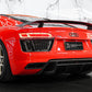 Red Audi car with a visible logo on a white background
