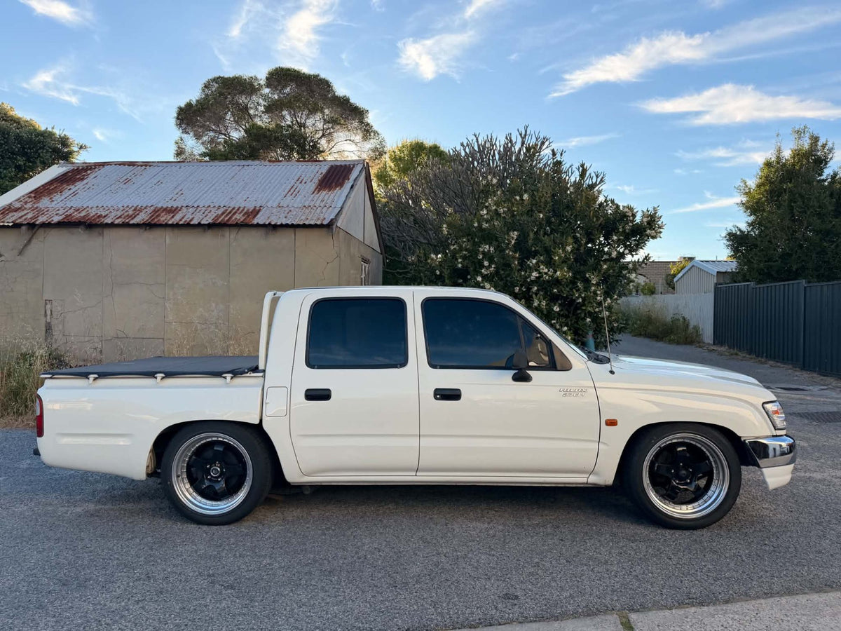 Toyota HiLux (N170) on SpeedWorks SW06 18x8.5 +35 Gloss Black & Machine Lip alloy wheels, customer photo 1 of 3