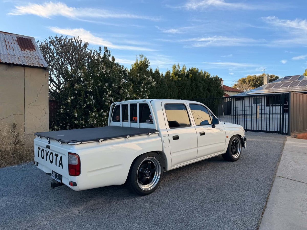 Toyota HiLux (N170) on SpeedWorks SW06 18x8.5 +35 Gloss Black & Machine Lip alloy wheels, customer photo 2 of 3