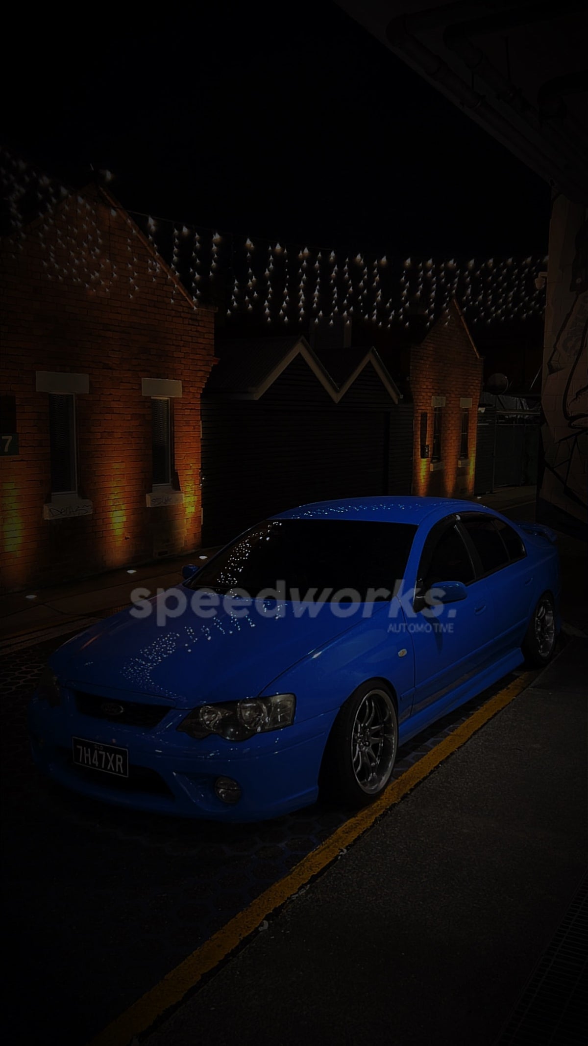 Ford Falcon (BA/BF) on SpeedWorks SW12 18x9.5 +22 Hyper Black & Machine Lip alloy wheels, customer photo 2 of 3