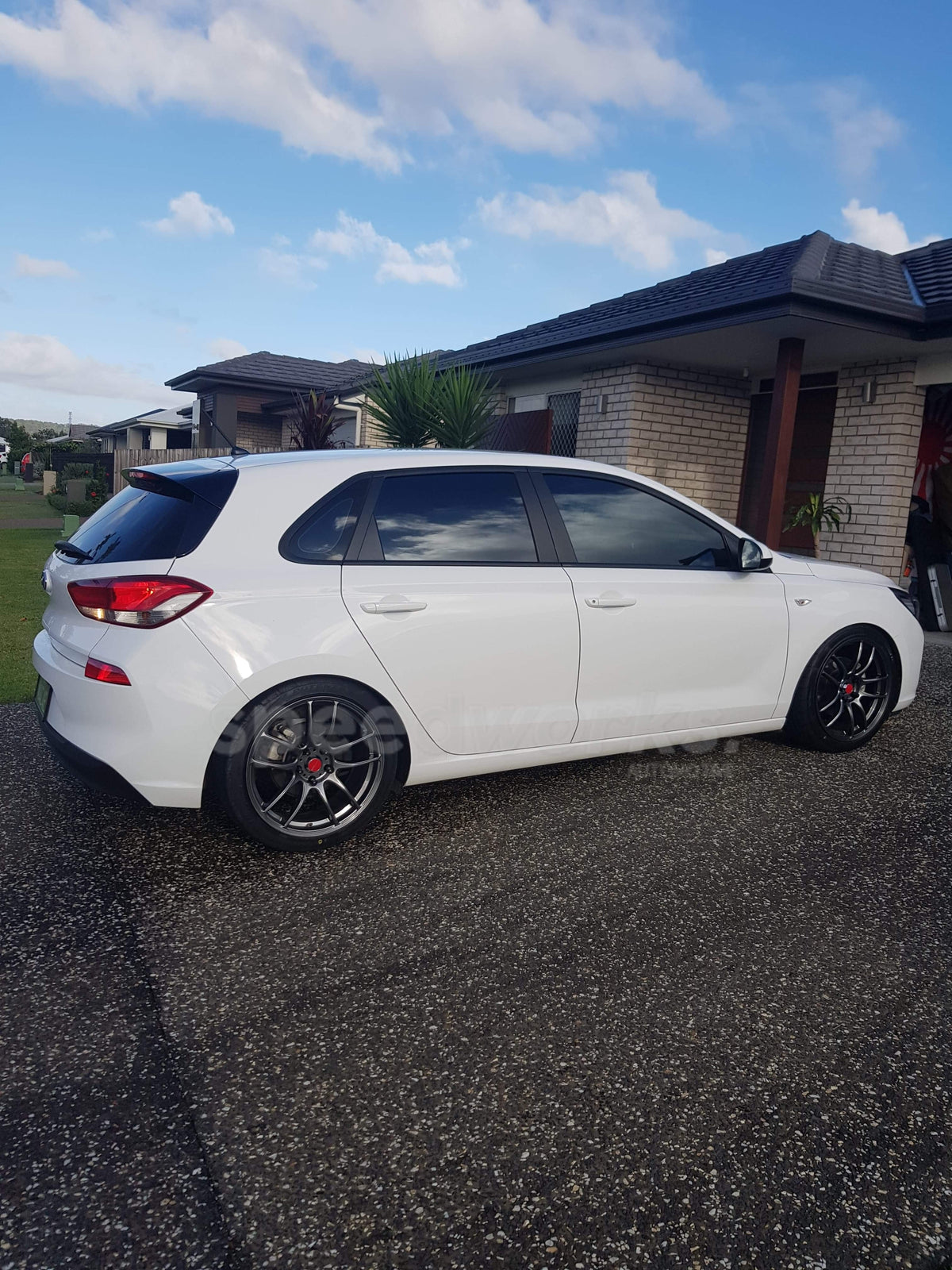 Hyundai i30 (PD) on SpeedWorks SW01 18x8 +38 Hyper Black alloy wheels