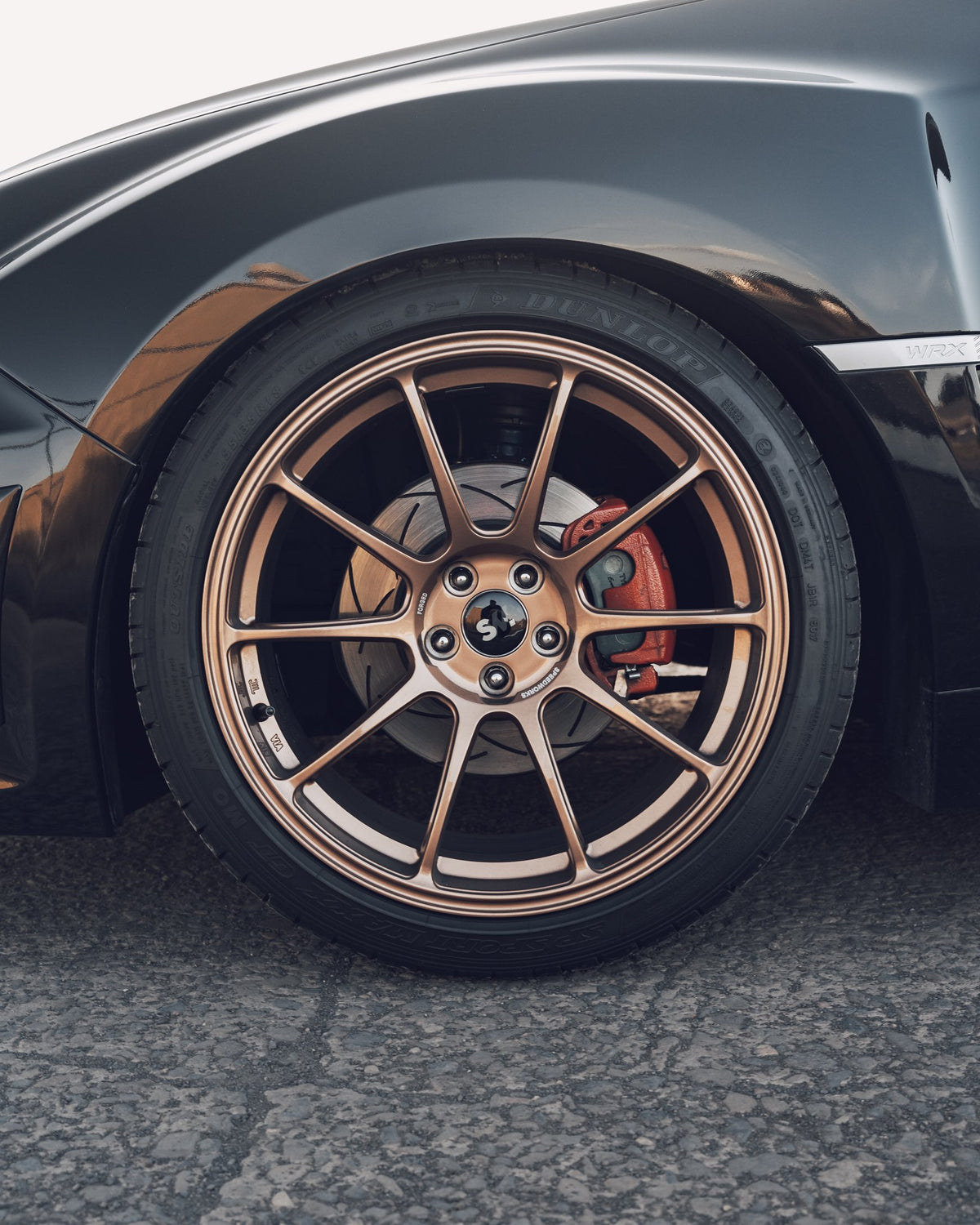 SWF01 forged wheels on a Subaru Impreza WRX, front wheel and brake