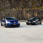 SWF02 forged wheels in Gloss Black on a blue Volkswagen Golf R Mk7, next to the black Mk7.5 Golf R on SWF03