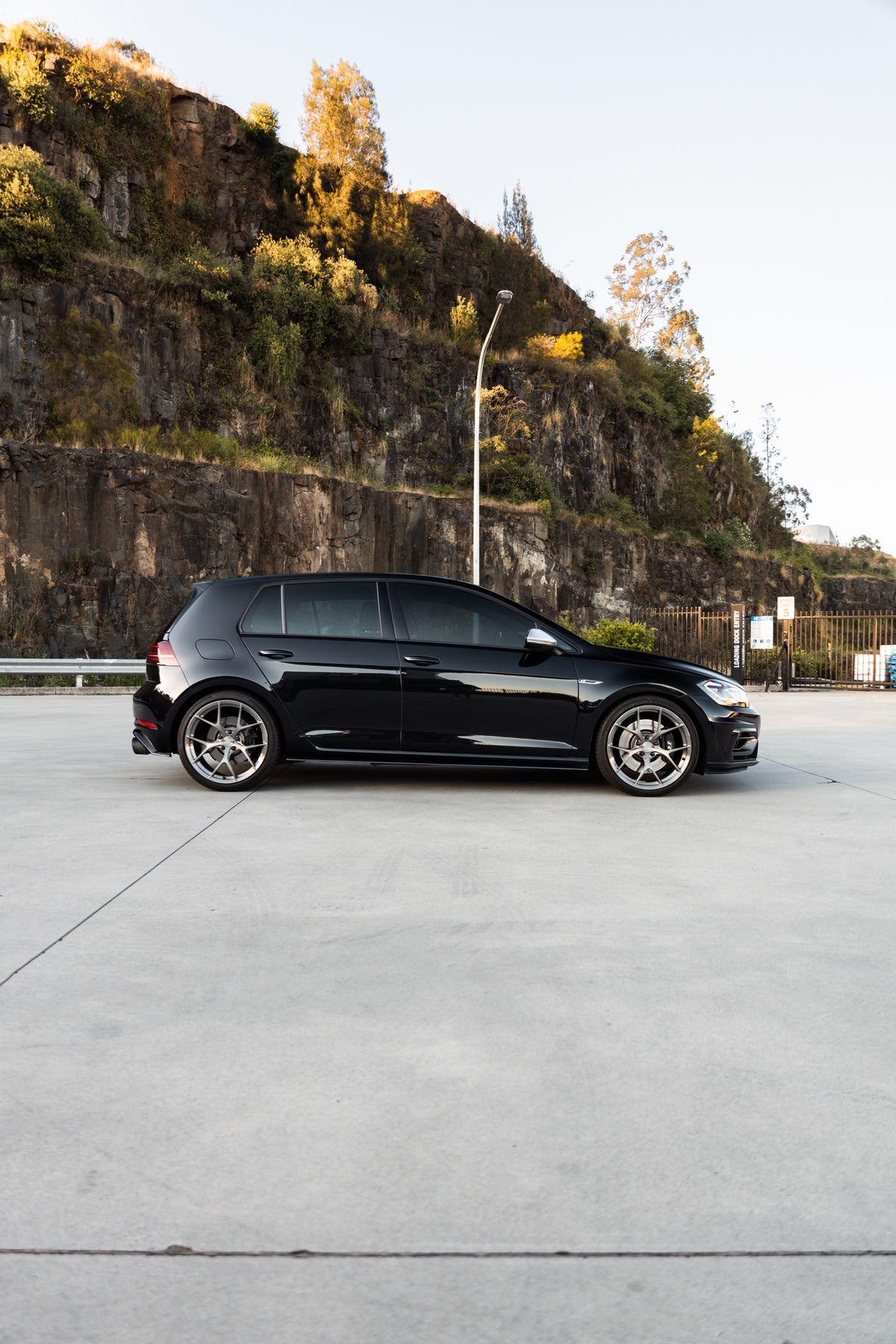SWF03 forged wheels in Brushed Grey on a black Volkswagen Golf R Mk7.5, side profile