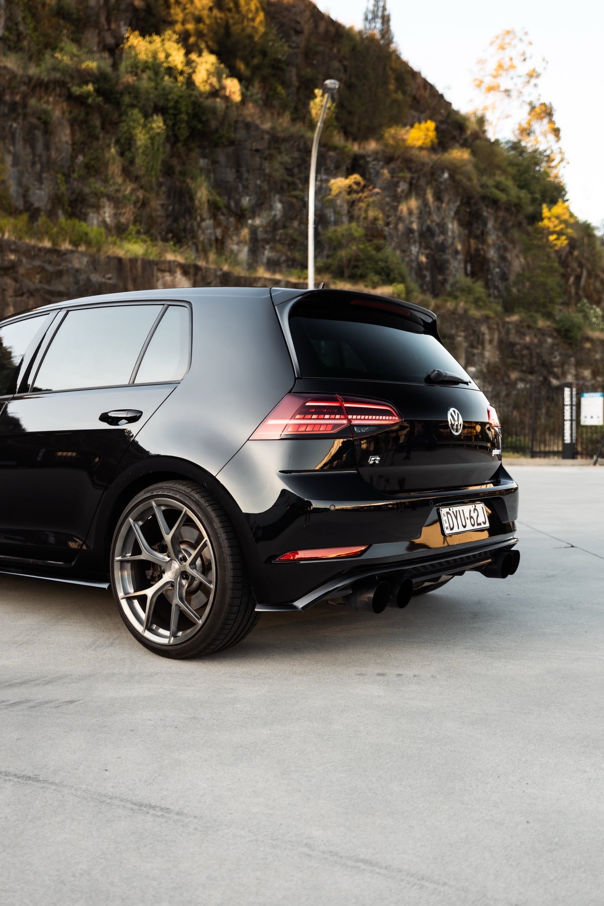 SWF03 forged wheels in Brushed Grey on a black Volkswagen Golf R Mk7.5, rear three-quarter