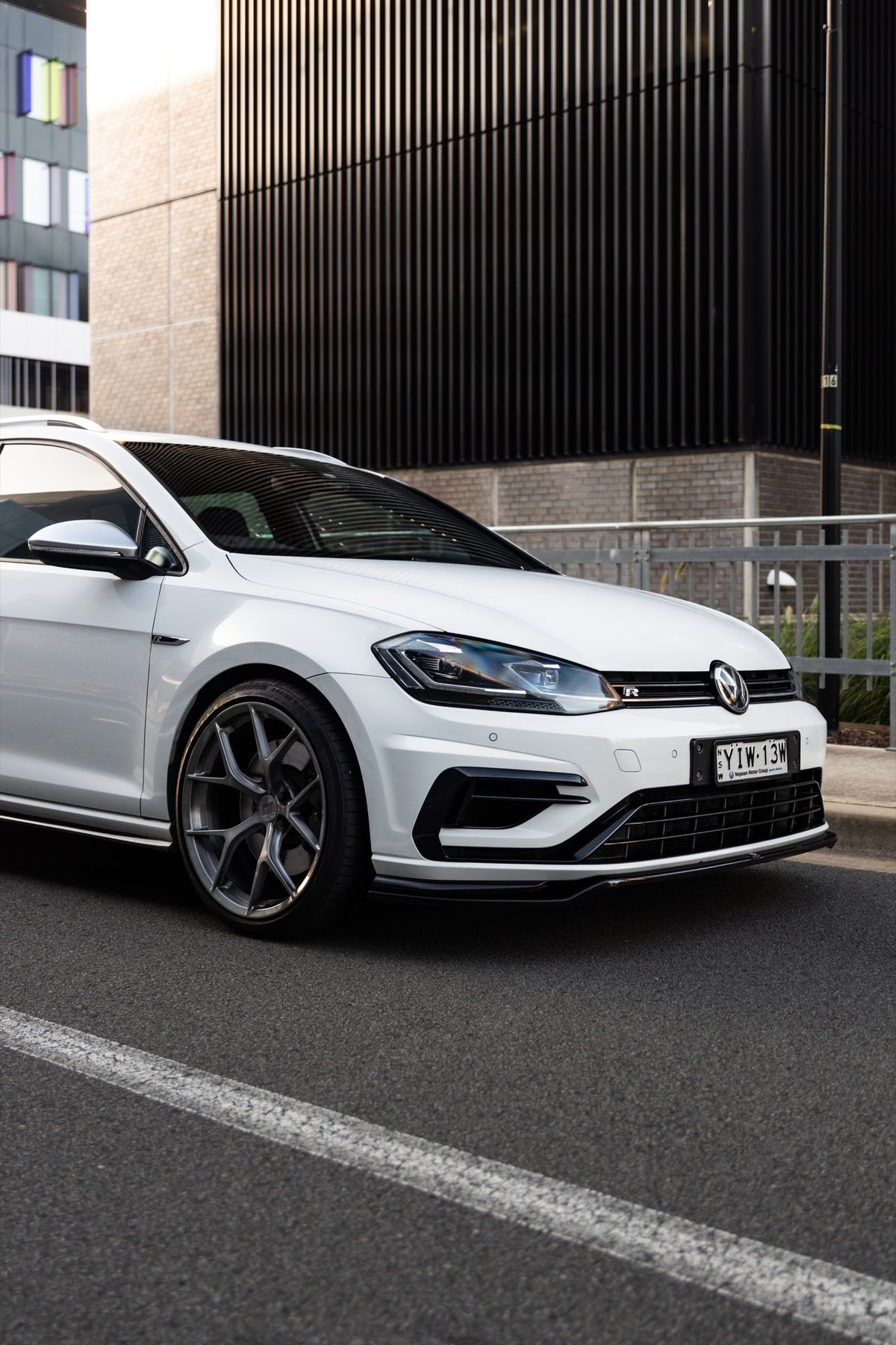 SWF03 forged wheels on a white Volkswagen Golf R Mk7.5 wagon, front three-quarter