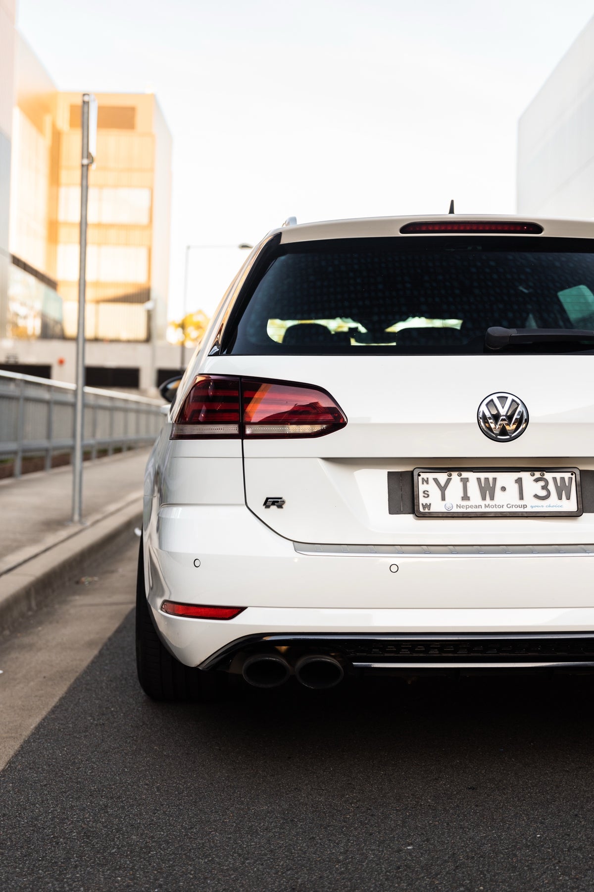 SWF03 forged wheels on a white Volkswagen Golf R Mk7.5 wagon, rear view
