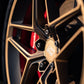 SWF04 forged wheels in Satin Bronze on a black Kia Stinger, spoke and centre cap detail