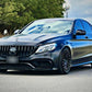 SWF14 forged wheels in Gloss Black on a matte black Mercedes-AMG C63 W205, front three-quarter from the left