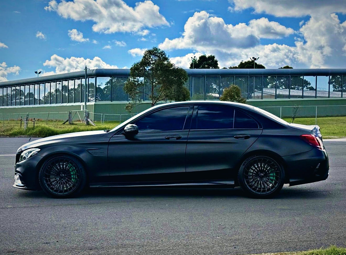 SWF14 forged wheels in Gloss Black on a matte black Mercedes-AMG C63 W205, side profile